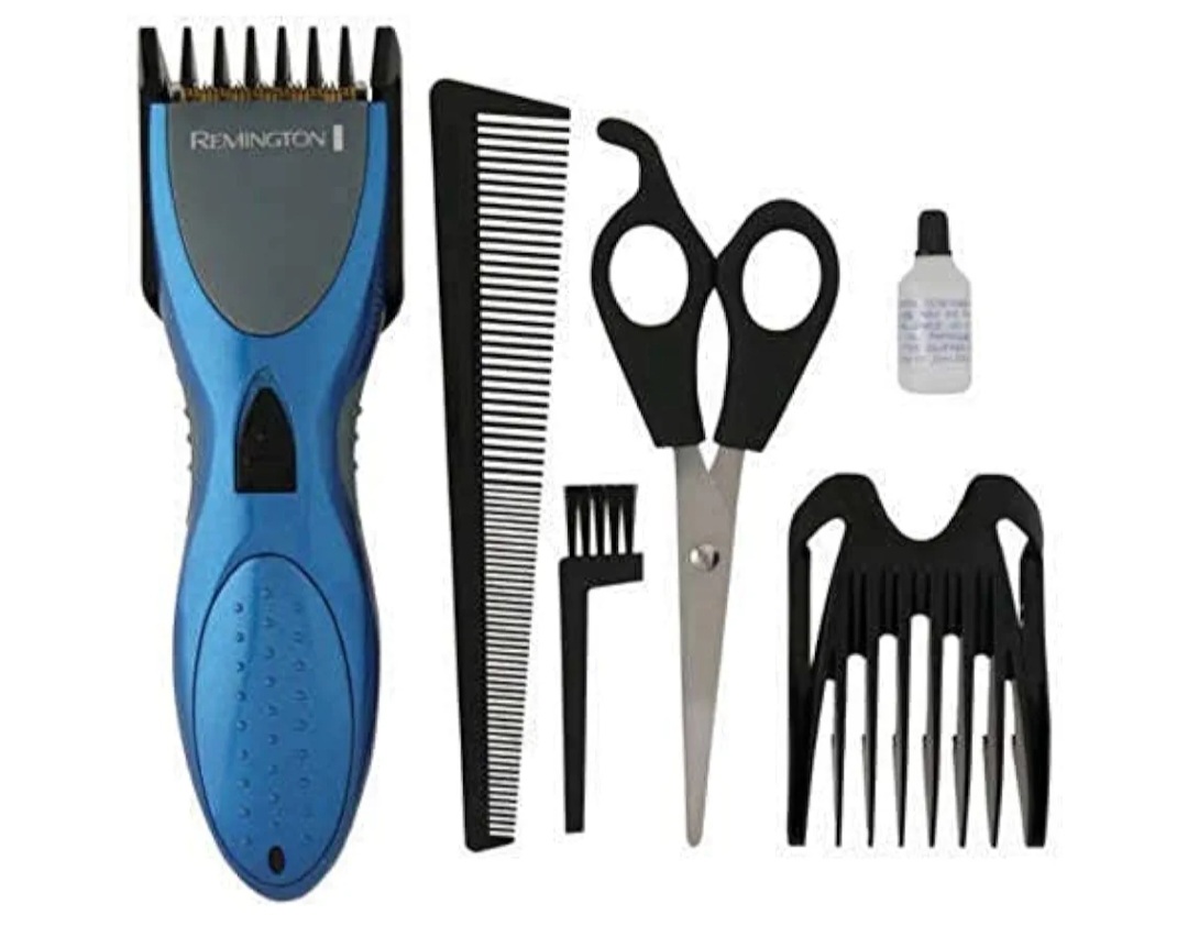 Kit de cortapelos Remington azul con peines guía, tijeras de peluquería, cepillo de limpieza y aceite lubricante.